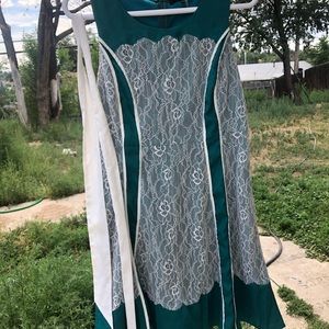 Ryu brand dress. Size M. Has ribbon type belt to tie around waist.